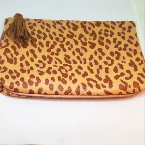 Ispy brown and pink animal print themed makeup pouch